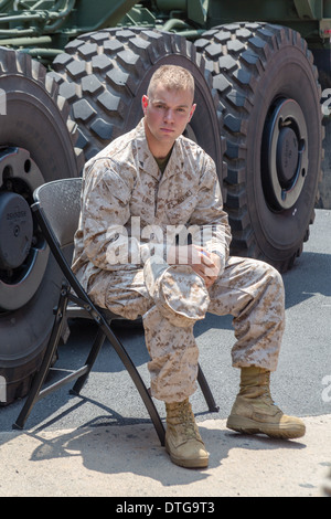 US Marine Lahey sits in Times Square during the New York City celebration of Fleet Week. Stock Photo