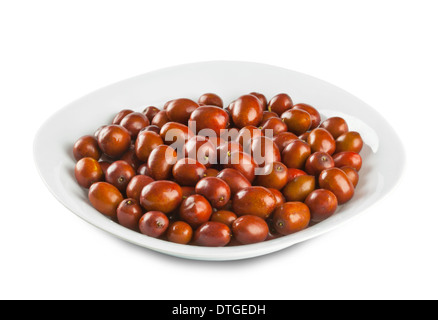 Plate of jujube isolated on white background Stock Photo