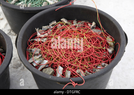 Longline ready for use whit bite on 300 fishhooks in each bucket. Stock Photo