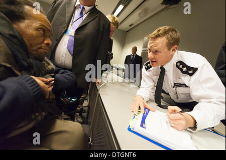 City Hall, London, UK. 17th February, 2014. A packed City Hall witnessed frustrating scenes at a public meeting hosted by the MPS & the Deputy Mayor for Policing & Crime to debate the issue of water cannon use in London. Boris Johnson has accepted in principle water cannon use in the capital. Credit:  Lee Thomas/Alamy Live News Stock Photo
