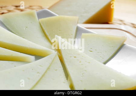 closeup of some slices of manchego cheese from Spain Stock Photo