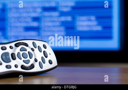 A Sky television remote control is pictured on a table at home. Stock Photo