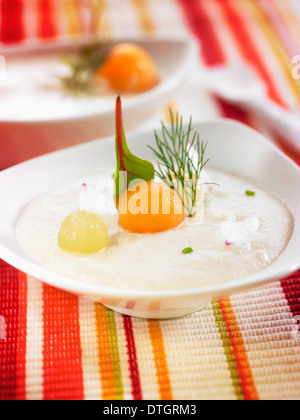 Ajoblanco with melon,grapes,garlic, bread and olive oil Stock Photo