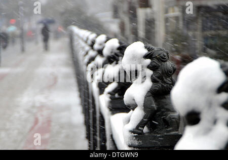 Yangzhou. 18th Feb, 2014. Photo taken on Feb. 18, 2014 shows a snow-covered bridge in Yangzhou, east China's Jiangsu Province. Snowstorms have been sweeping parts of China, wreaking havoc on traffic and crops. Credit:  Liu Jiangrui/Xinhua/Alamy Live News Stock Photo