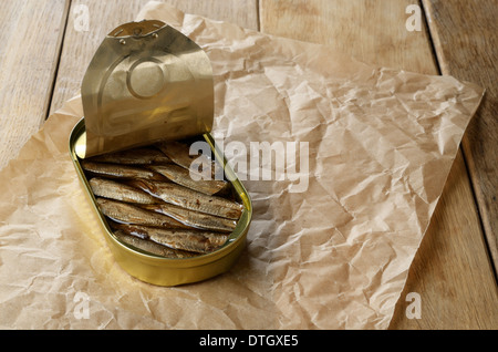 Opened Sprat tin can on the table Stock Photo