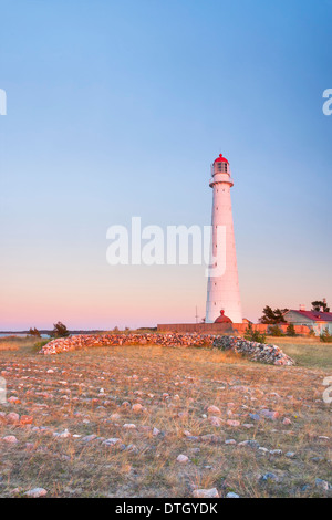 Tall white Tahkuna lighthouse in Hiiumaa, Estonia at sunset Stock Photo