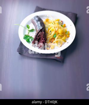 Blood sausage with mango Stock Photo