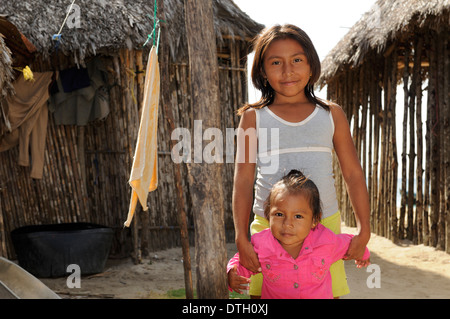 Two girls in a Kuna Indian village, Nalunega, San Blas Islands, Panama Stock Photo