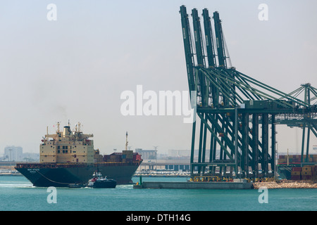 Container ship arriving Valencia port Spain Stock Photo