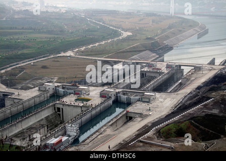 high angle view showing the Three Gorges Dam at Yangtze River in China at evening time in misty ambiance Stock Photo