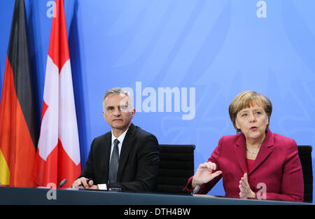 Berlin, Germany. 18th Feb, 2014. German Chancellor Angela Merkel (R) and visiting Swiss President Didier Burkhalter attend a press conference after their meeting at the Chancellery in Berlin, capital of Germany, on Feb. 18, 2014. © Zhang Fan/Xinhua/Alamy Live News Stock Photo