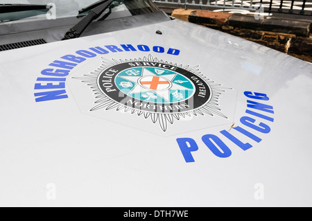 Police Service of Northern Ireland Neighbourhood Policing logo on the bonnet of a patrol car Stock Photo