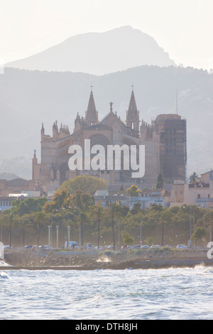 13th century cathedral of Palma de Majorca. East facade at sunset. View from Can Pere Antoni beach. Balearic islands, Spain Stock Photo