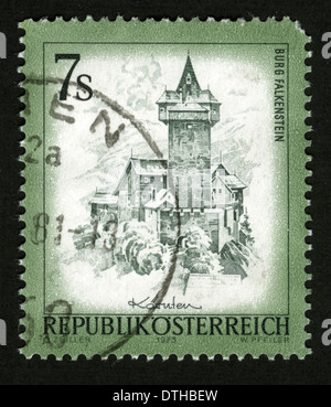 Republic of Austria Postage Stamp close up in black background Burg Falkenstein is a castle near Obervellach in Carinthia, Austr Stock Photo