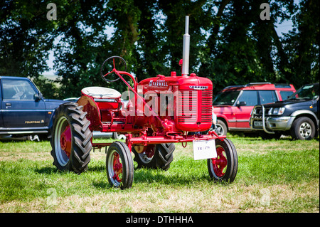 International Harvester Farmall tractor restored and on show at an English country event Stock Photo