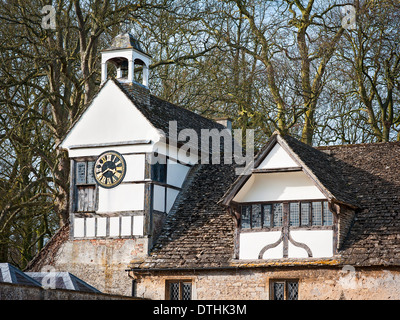 Clock tower and courtyard buildings at Lacock Abbey UK Stock Photo