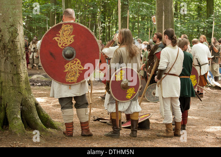 Viking warriors preparing for battle at a reenactment in Denmark Stock Photo
