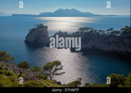 Cala Murta cove mouth and pine tree. Es Castellet rock. Formentor peninsula. Pollensa harbour. Majorca, Balearic islands, Spain Stock Photo