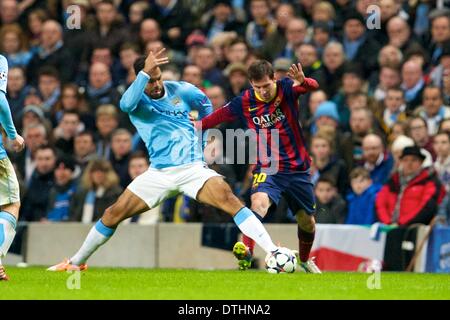 Manchester, UK. 18th Feb, 2014. FC Barcelona forward Lionel Messi beats Lescott during the Champions League game between Manchester City and Barcelona from the Etihad Stadium. Credit:  Action Plus Sports/Alamy Live News Stock Photo