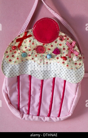cupcake bag set on pink background Stock Photo