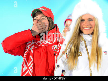 Sochi, Russia. 18th Feb, 2014. Left to right: Medalist in the women's biathlon 12.5K mass start, Gabriela Soukalova of the Czech Republic, silver, and Darya Domracheva of Belarus, gold, pictured during the medals ceremony at the 2014 Winter Olympics in Sochi, Russia, Tuesday, February 18, 2014. Credit:  Roman Vondrous/CTK Photo/Alamy Live News Stock Photo
