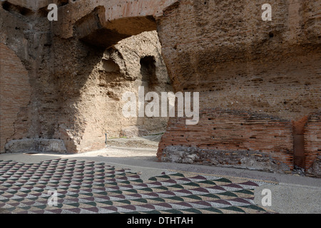 Flooring with coloured marble mosaic tesseras on Northern end eastern palaestra Baths Caracalla Rome Italy Stock Photo