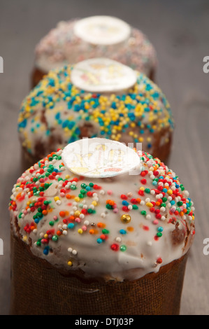 Three Easter cakes on a wooden table Stock Photo
