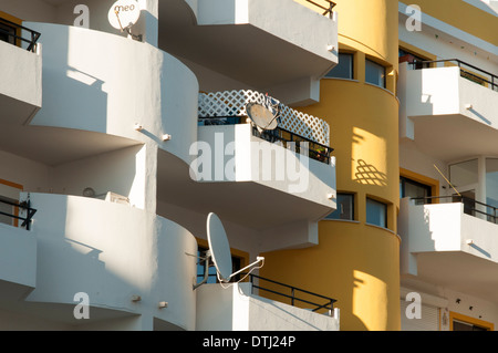 modern apartment building in the Algarve Portugal with satellite dishes Stock Photo