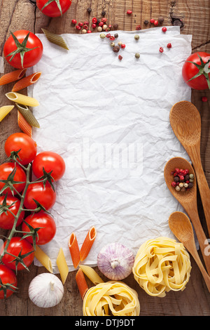 blank paper for recipes with ingredients, pasta, pepper and spices on ...