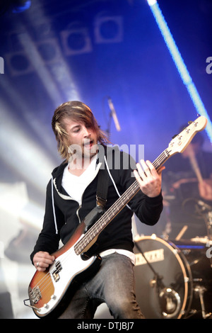 MUSICIAN PLAYING THE GUITART AT A ROCK CONCERT Stock Photo