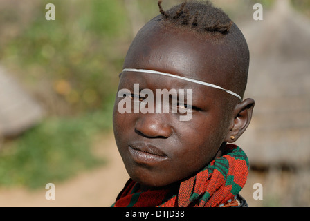 Uganda Karamoja Kotido, Karimojong people, pastoral tribe, portrait of young boy Stock Photo