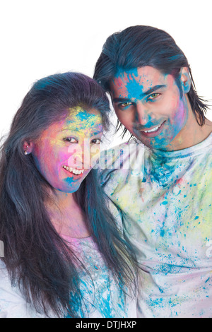 couple celebrating Holi Stock Photo