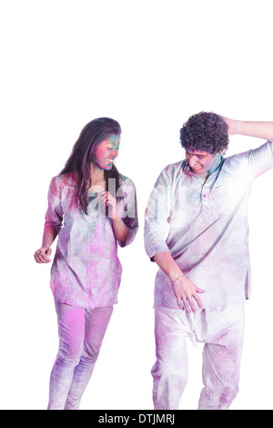 couple playing holi and dancing Stock Photo
