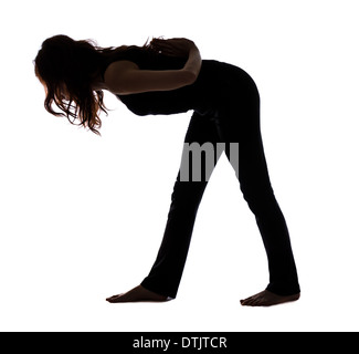 Woman doing Intense Side Stretch Pose in Yoga, Silhouette (Series with the same model available) Stock Photo