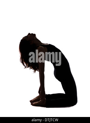 Woman doing Camel pose in yoga, SIlhouette (Series with the same model available) Stock Photo