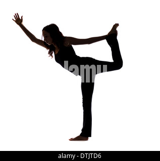 Woman doing Lord of the Dance Pose in Yoga, Silhouette (Series with the same model available) Stock Photo
