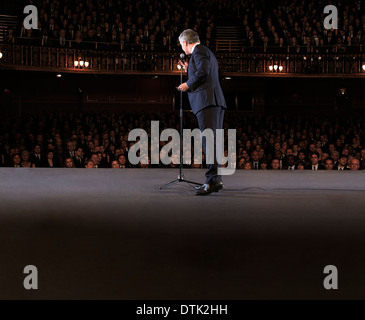 Performer on stage in theater Stock Photo