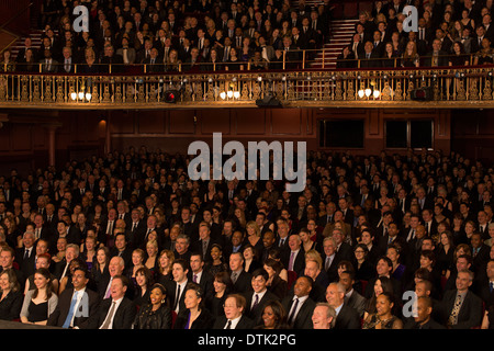 Audience sitting in theater Stock Photo