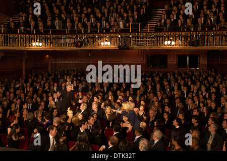 Spotlight on angry audience members in theater Stock Photo