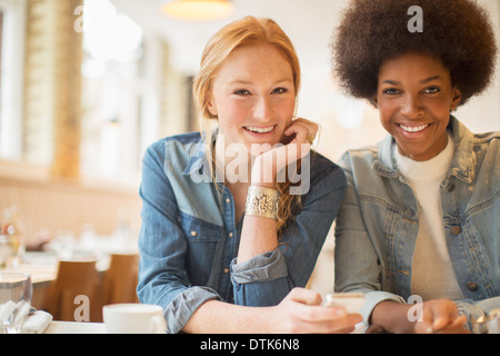 Women enjoying coffee together in cafe Stock Photo