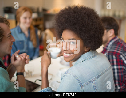 Friends drinking coffee in a bar table, silhouette Stock Photo, Royalty ...