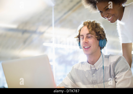 Business people using laptop in office Stock Photo