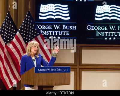 Dallas, TX, USA . 19th Feb, 2014.  Jill Biden, wife of Vice President Joe Biden, jokes about being a 'wounded warrior' holding up the cast on her broken wrist, in OD camouflage. She and the First Lady, Micheal Obama formed Joining Forces to help military veteran's get back to civilian life. Credit:  J. G. Domke/Alamy Live News Stock Photo