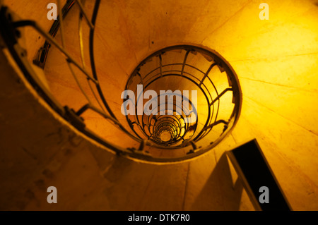 Looking up the stairwell inside one of the legs of the Arc de Triomphe in Paris, France. Stock Photo