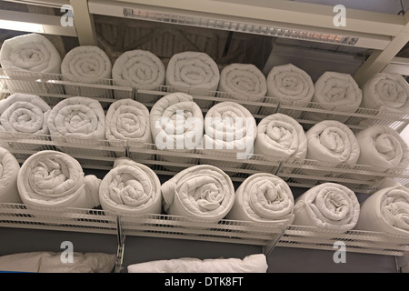 Rolled up duvet for sale Stock Photo