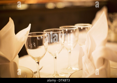 Close up of wine glasses on restaurant table Stock Photo