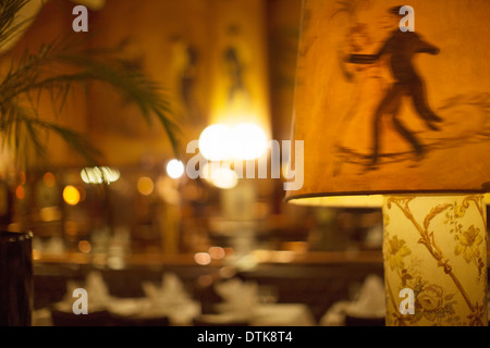 Illustrated dancers on lampshade in restaurant Stock Photo