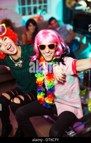 Couple wearing costumes at party Stock Photo