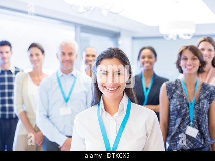 Business people smiling in office Stock Photo