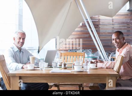 Businessmen working in office Stock Photo